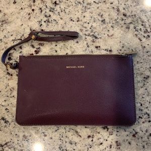 Michael Kors wallet / wristlet - color PLUM.